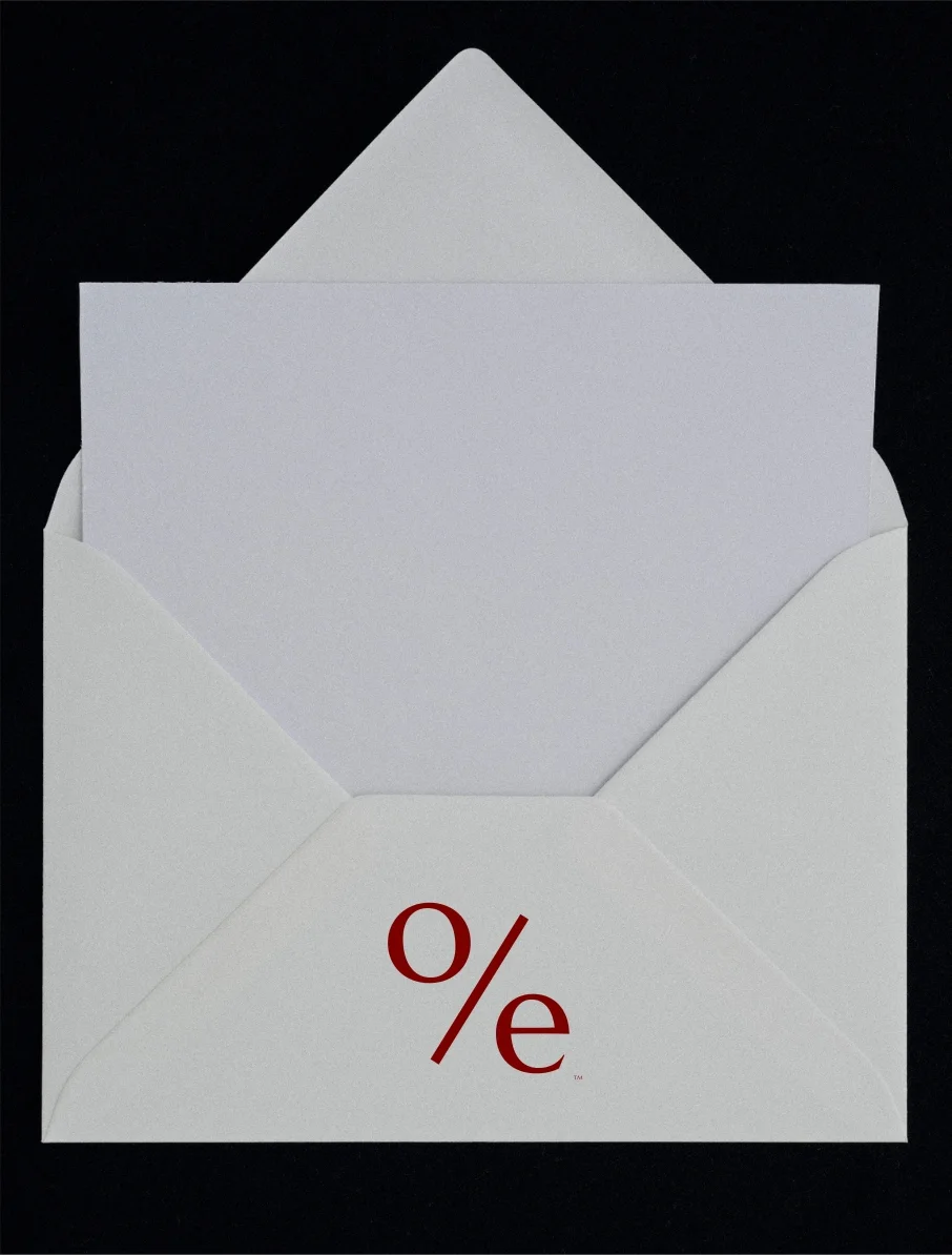 An open envelope marked with the o/e monogram